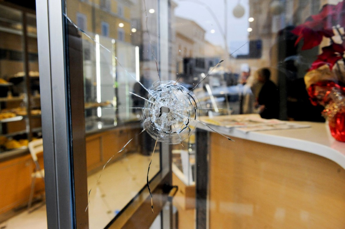 ITALY-SHOOTING-ARREST